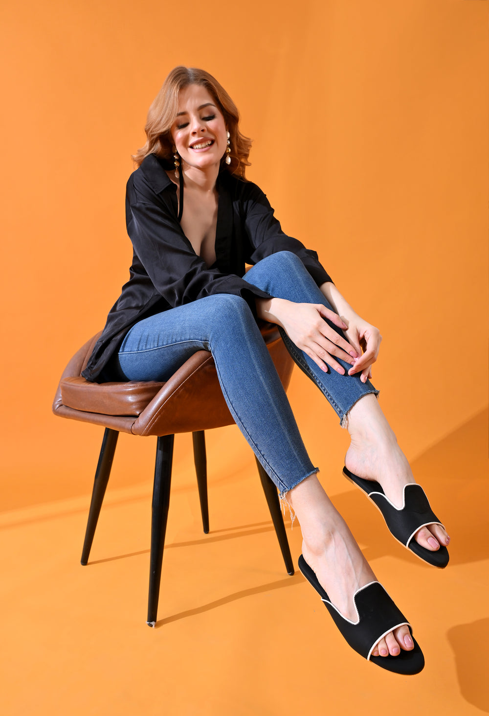Windlust Contour Edge Flats in Ink and Ivory featuring sleek design and pointed toe, perfect for stylish everyday wear.
