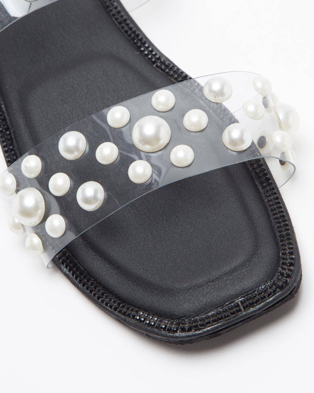 Black Heavenly Pearl Flats by Windlust from the Classic Collection, featuring a sleek, elegant design with pearl accents.