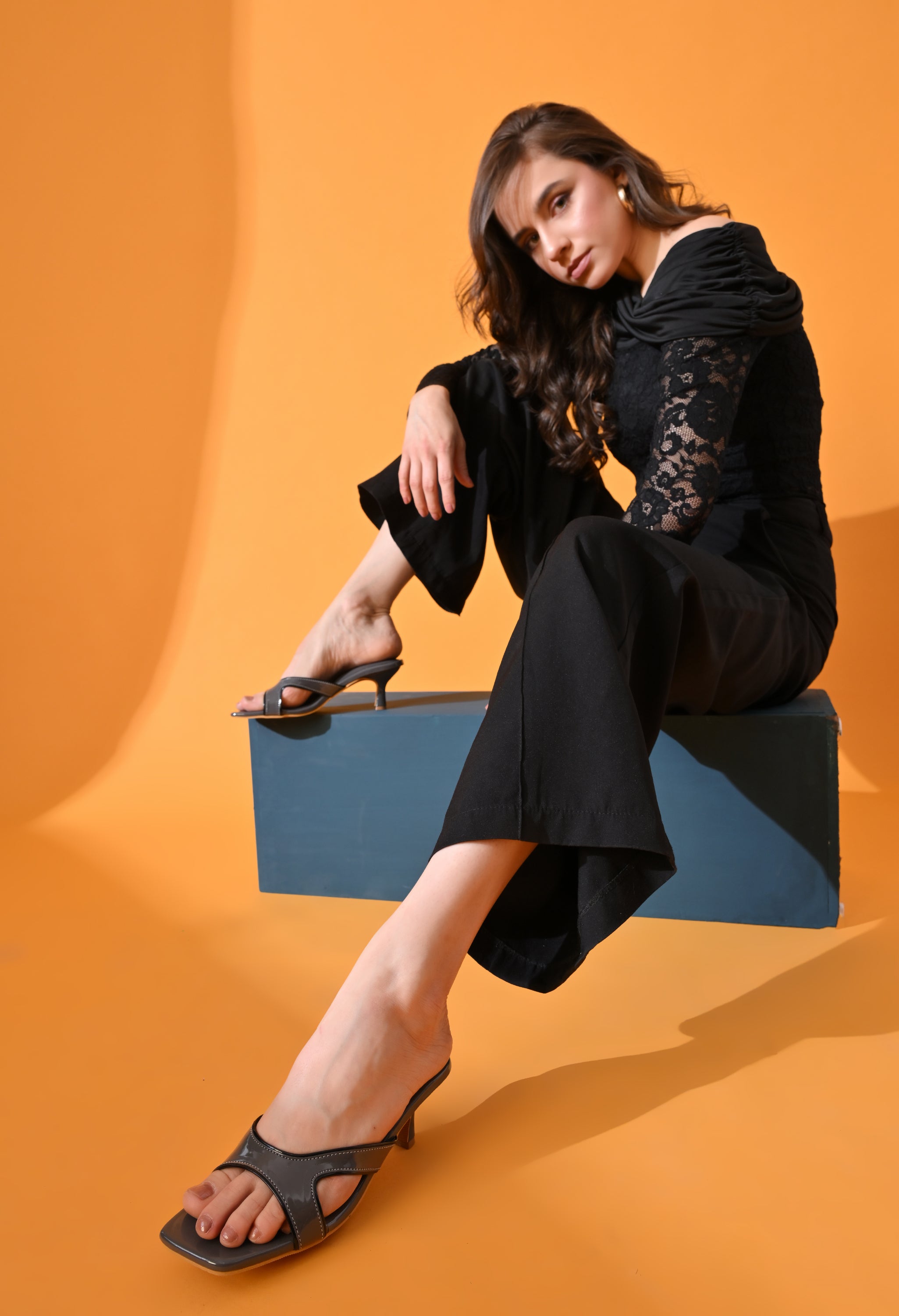 Gunmetal grey patent interlocked kitten heels by Windlust, stylish and sleek footwear with a modern, elegant design.