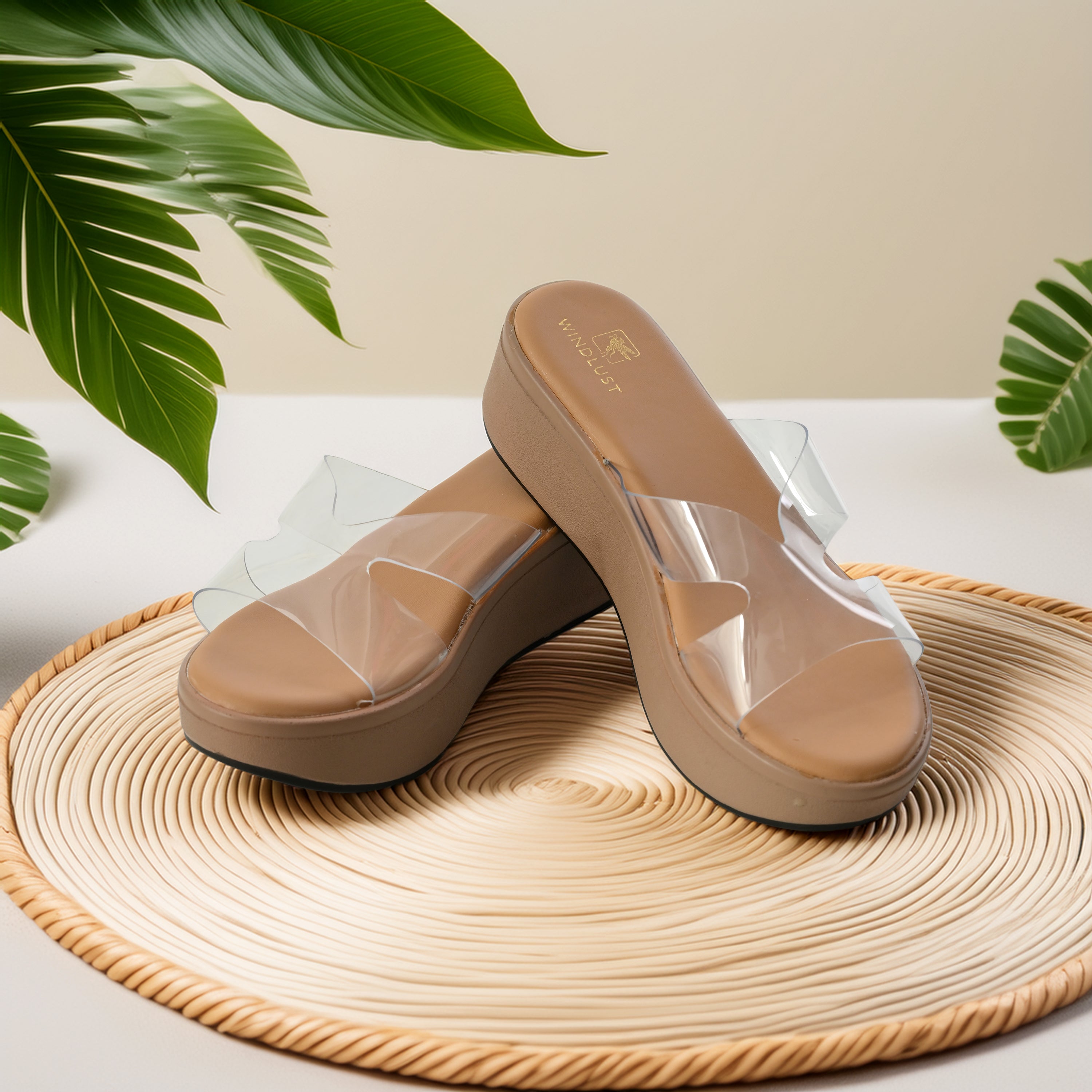 Beige Windlust CLEAR X-FLOW wedge shoe, stylish and comfortable footwear with a modern design, shown from side view.