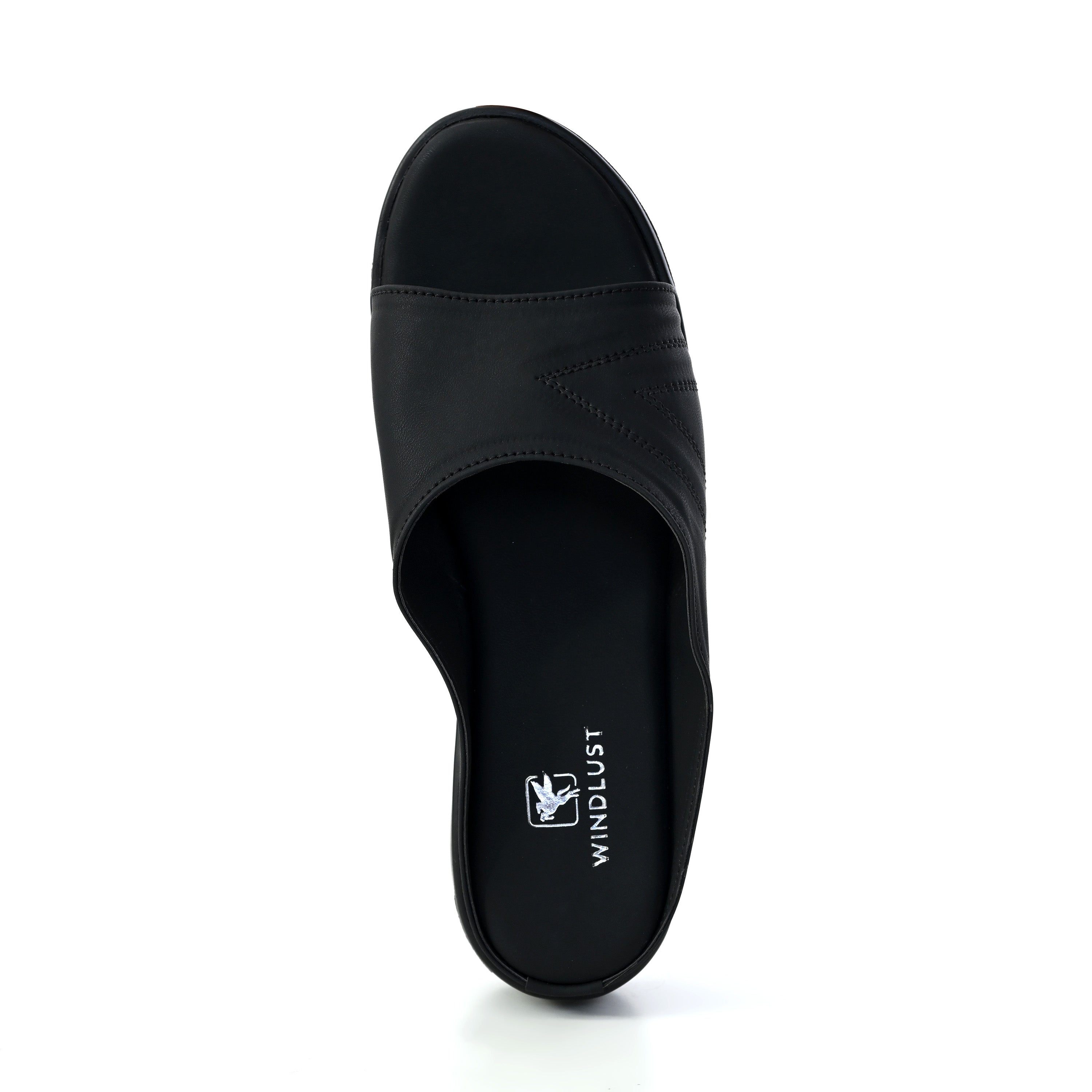 Windlust Luxè Sewed In Wedge in Dense Black showing the stylish, comfortable wedge heel and sleek black leather design.