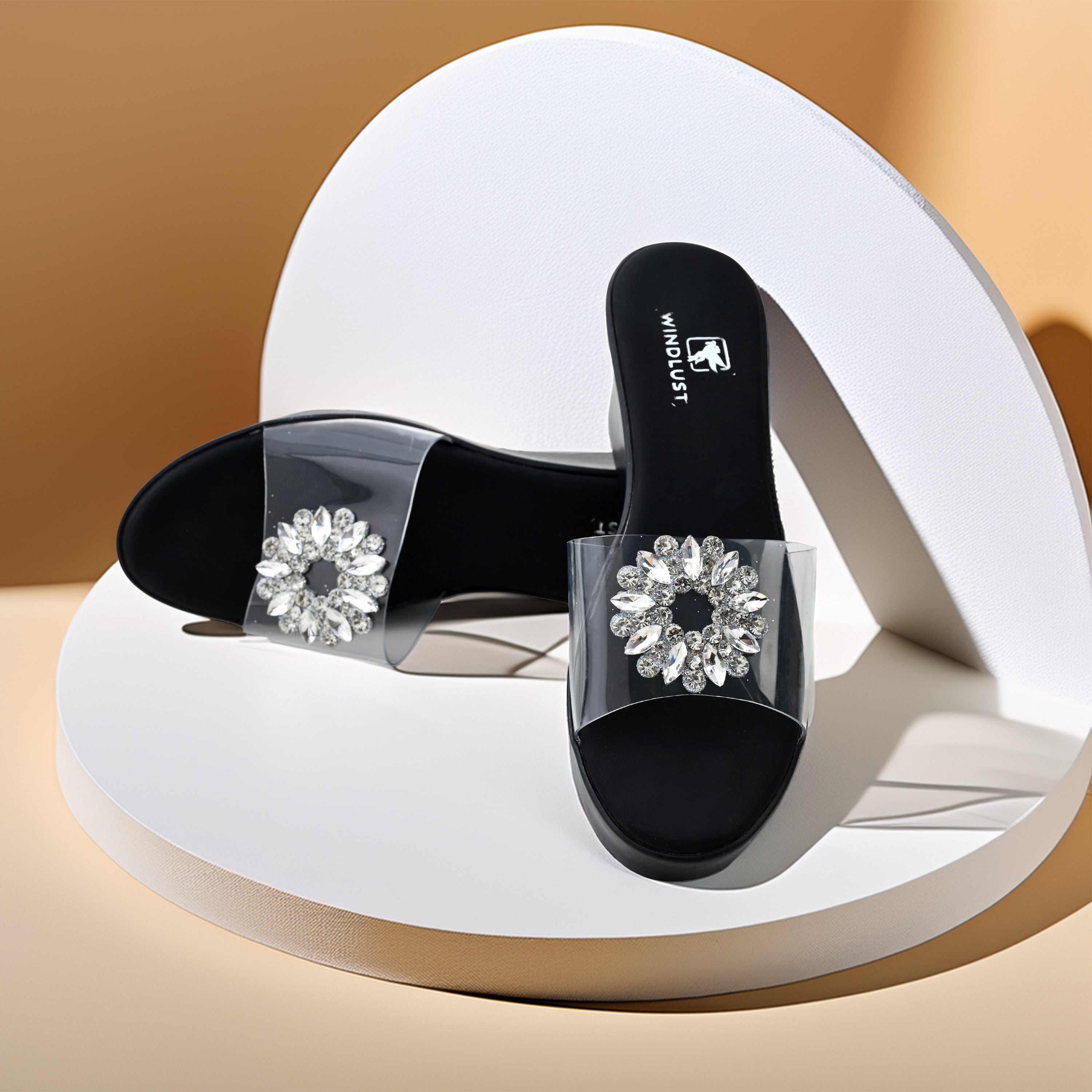 Black Swarovski-embellished clear strap wedges by Windlust, stylish and comfortable women's wedge sandals.