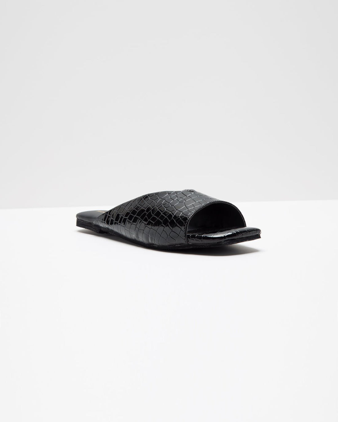 Black Ergo Croc Leather Pattern Flats by Windlust showcasing textured crocodile design and sleek slip-on style.