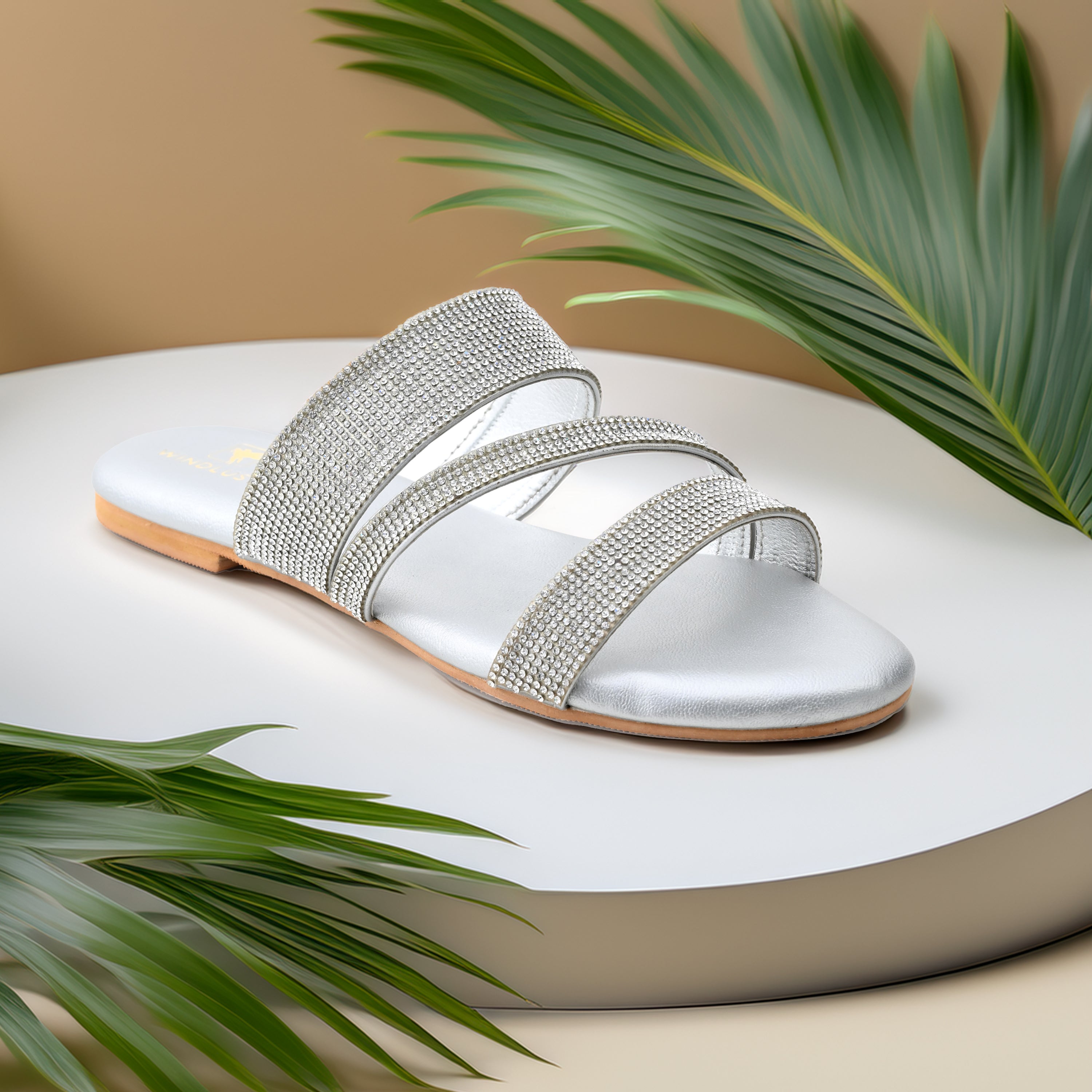 Silver Swarovski Bling Strap Flats by Windlust featuring sparkling embellishments and comfortable flat design for stylish wear.
