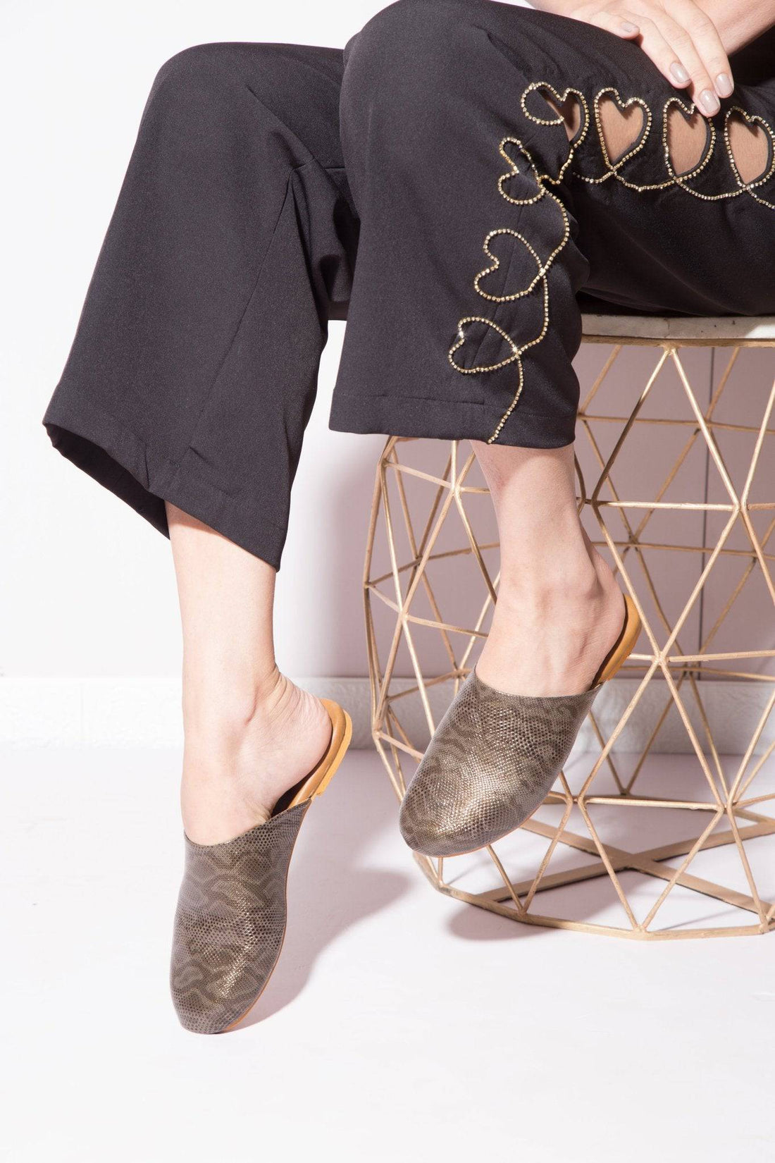 Windlust textured snake print flats with pointed toes and sleek design, showcasing stylish footwear for casual or dressy wear.