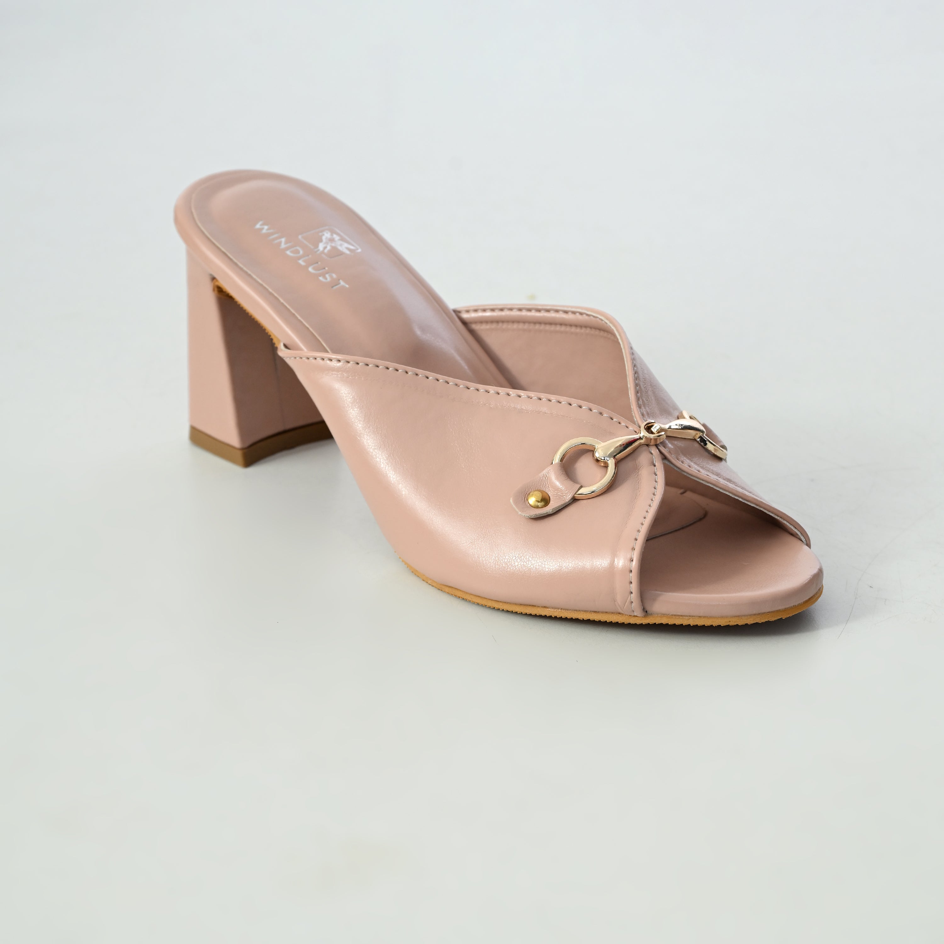 Windlust Block n Brooch Luxe Heels in Mystic Pink showing stylish high-heeled shoes with decorative embellishments.