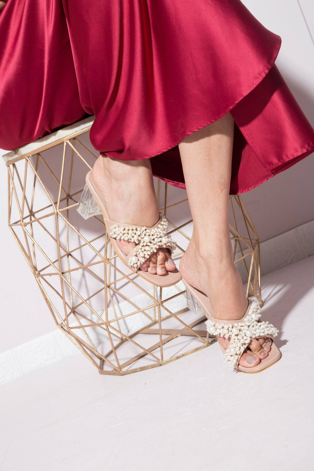 Nude Windlust Cross Strap Pearl Embellished Heels with elegant ankle straps and decorative pearl details for women.