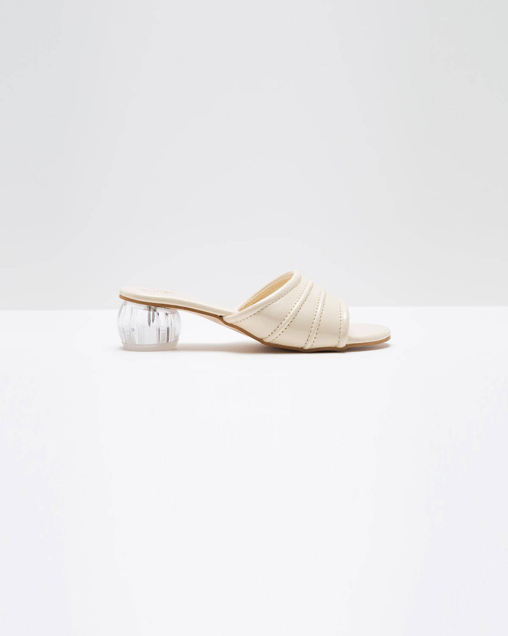 Cream glossy pumps with spherical heel by Windlust, elegant high-heeled shoes for formal or stylish wear.