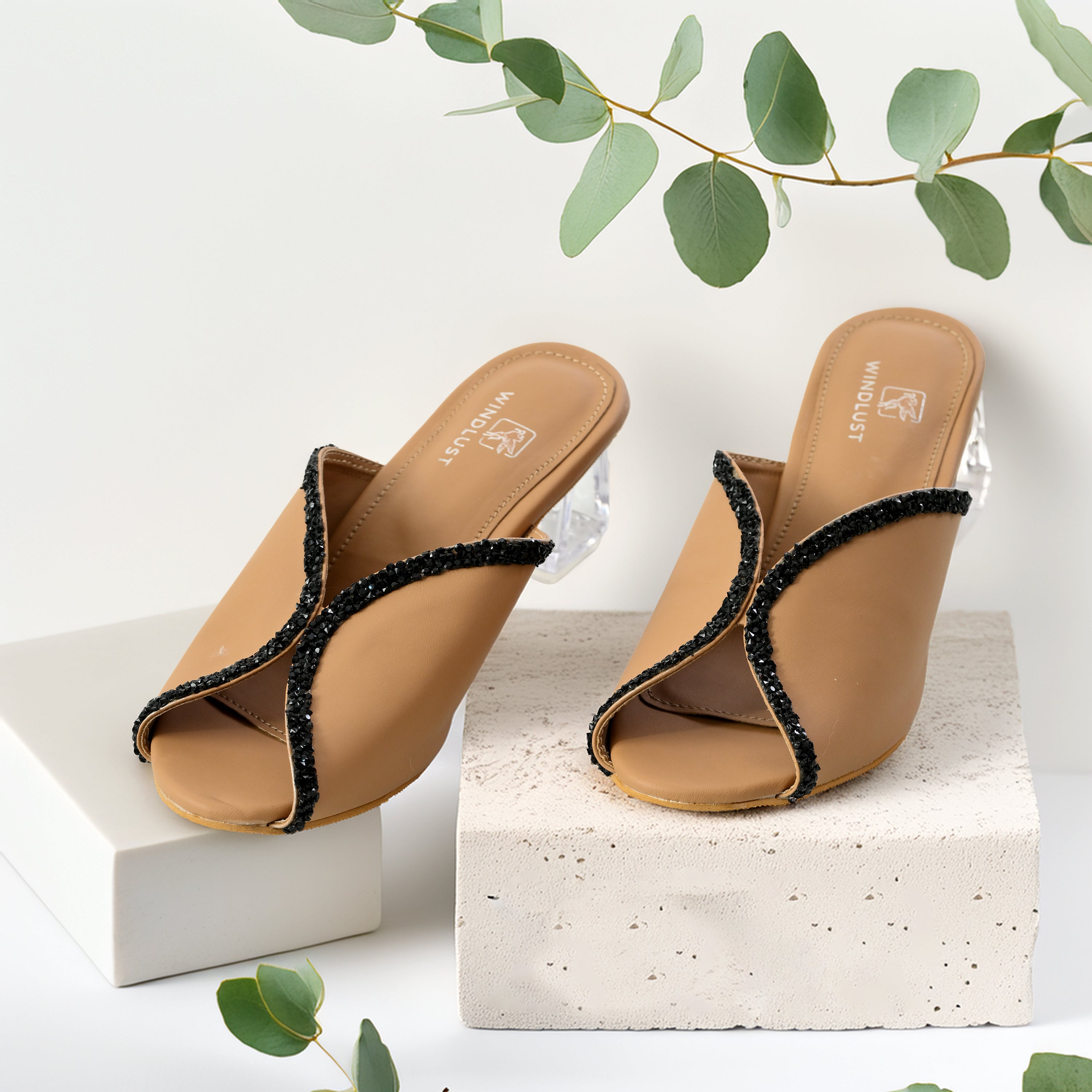 Beige Swarovski-embellished Windlust heeled shoes with hollow heel, stylish and elegant footwear for women.