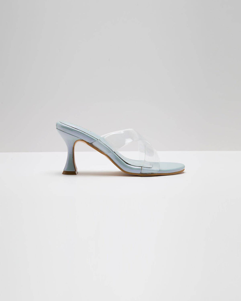 Light metallic blue transparent cross-strapped pumps, Windlust heels, showcasing elegant design and stylish heel footwear.