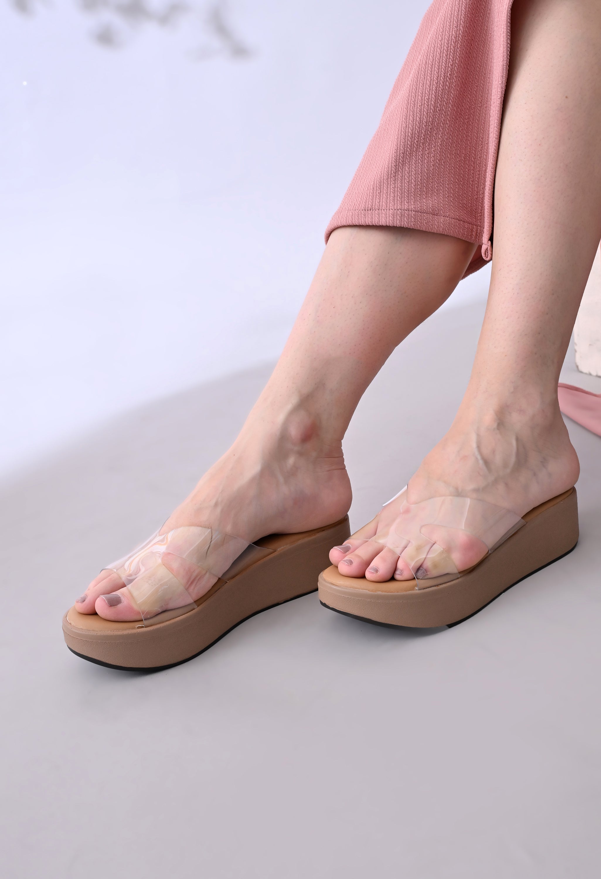 Beige Windlust CLEAR X-FLOW Wedge sandal with open toe and ankle strap, showcasing stylish summer footwear.