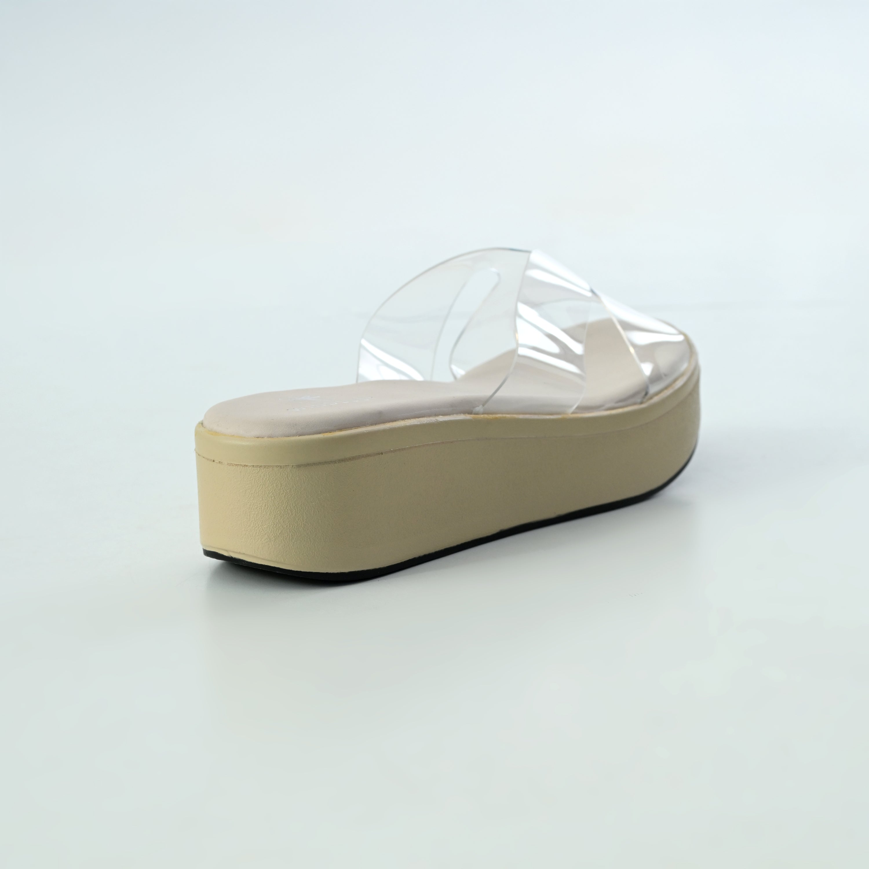 Cream-colored Windlust CLEAR X-FLOW wedge shoes with a sleek design and open toe style.