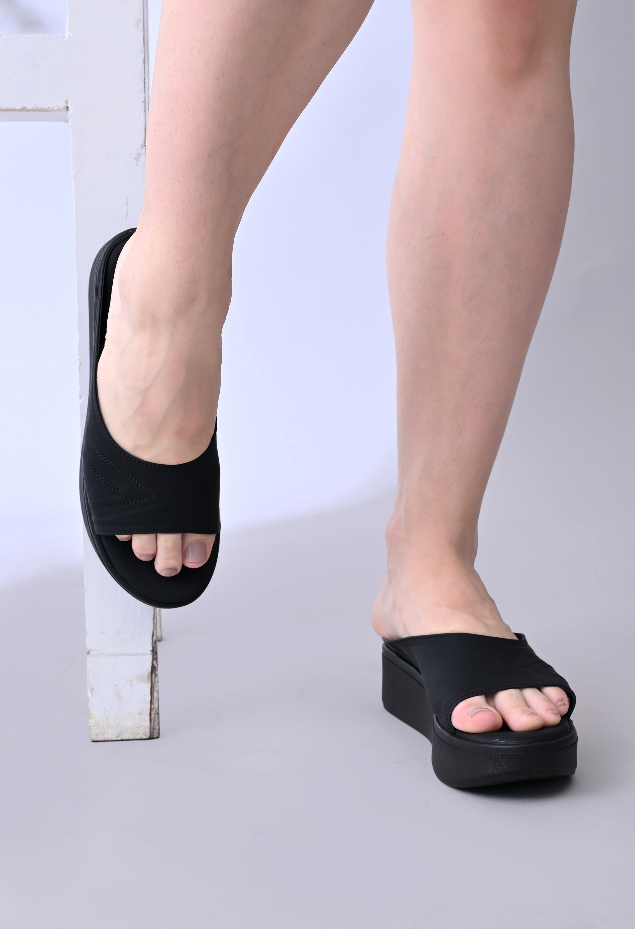 Windlust Luxè Sewed In Wedge in Dense Black, stylish women's wedge shoes with a sleek, sewn-in design and comfortable heel.