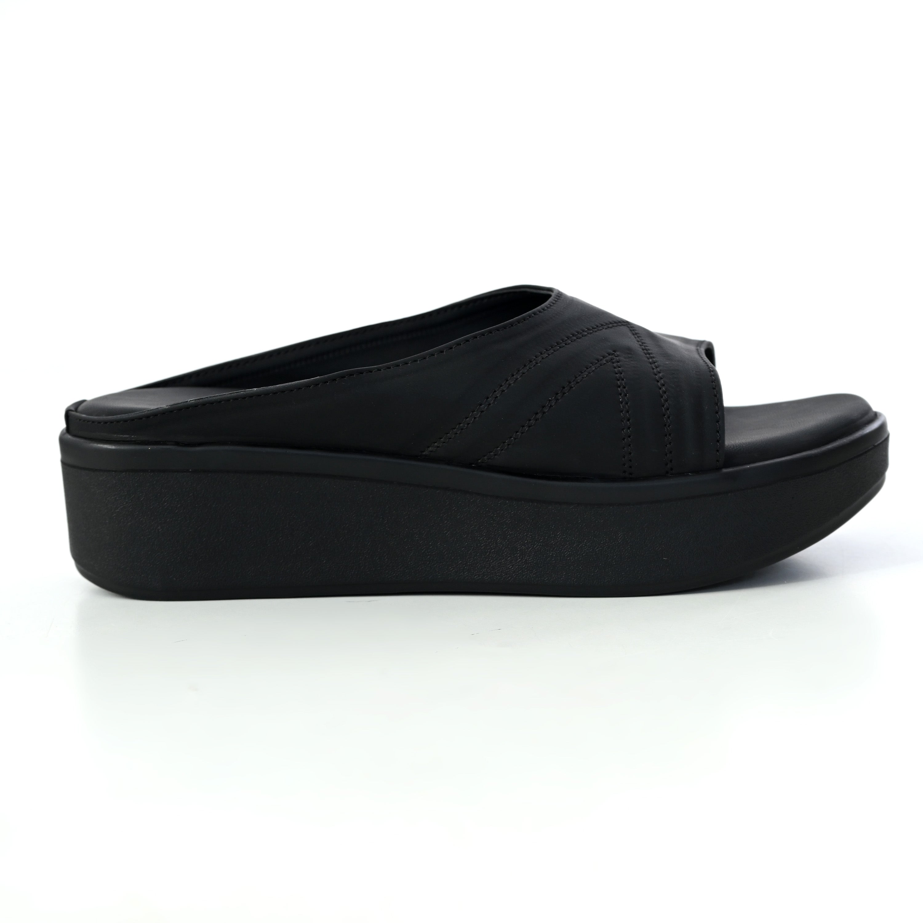 Windlust Luxè Sewed In Wedge in Dense Black featuring a stylish woven design and sturdy wedge heel.